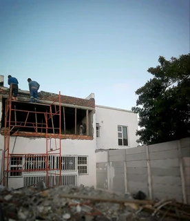 Skilled brick layers and plasters