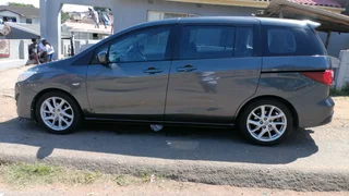 Mazda 5 2012 model 7 seater electric doors 95k negotiable