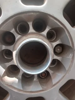 A set of 4 15inch rims and they come with tires.  Second hand but in good condition