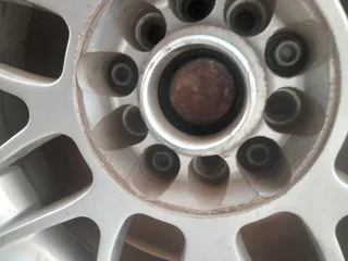 A set of 4 15inch rims and they come with tires.  Second hand but in good condition