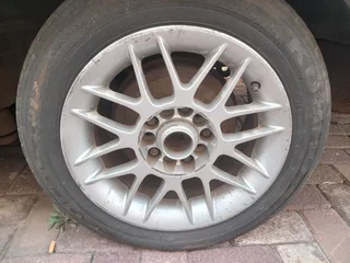 A set of 4 15inch rims and they come with tires.  Second hand but in good condition