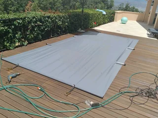 Swimming pool covers