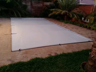 Swimming pool covers