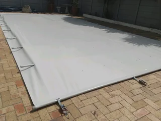 Swimming pool covers