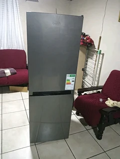 Metallic silver Defy fridge freezer