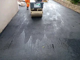 TAR ROADS &amp; DRIVEWAYS