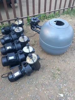 Refurbished swimming pool pumps and sand filters