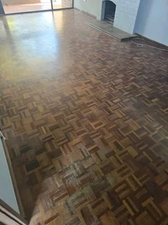 Wooden flooring restoration services especially for Oregon pine parquet planks sanding and sealing.