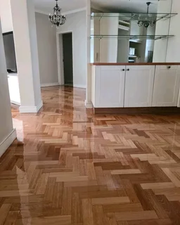 Wooden flooring restoration services especially for Oregon pine parquet planks sanding and sealing.