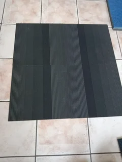 Executive Rubber underneath carpet tiles