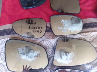 GLASS FOR SIDE MIRRORS OF CARS