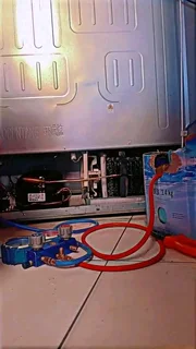 Fridge repairs and regasing R450