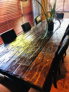 Solid and heavy dining table seats 10 people