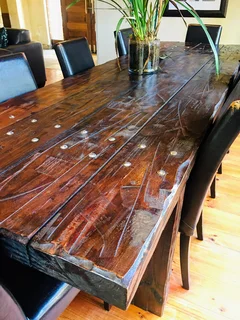 Solid and heavy dining table seats 10 people