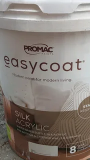 More than half bucket of white paint