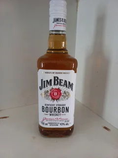Bottle of&#34;Jim Beam&#34; whiskey on sake