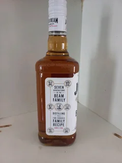 Bottle of&#34;Jim Beam&#34; whiskey on sake