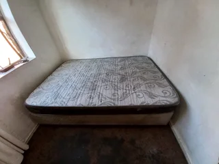 Used base and mattress on sale.