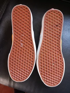 A pair of "Vans"shoes on sale.