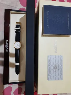 ⁸Men's Longines watch for sale
