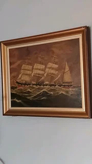 I'm  selling an painting of a sailing ship the price is R2500.