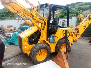 JCB 1 cx and Cat 226 skid steer loader for sale as a package