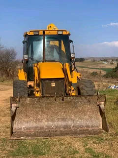 JCB 1 cx and Cat 226 skid steer loader for sale as a package