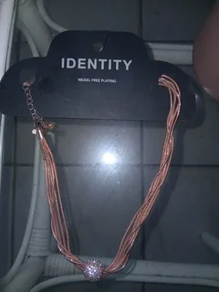 Stunning gold plated necklace brand new with diameter pendent