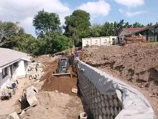 We do retaining walls tar driveway resurfacing concrete paving building renovations roofing more inf