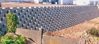 We do retaining walls tar driveway resurfacing concrete paving building renovations roofing more inf