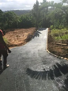 We do tar driveway resurfacing concrete paving building roofing plaster