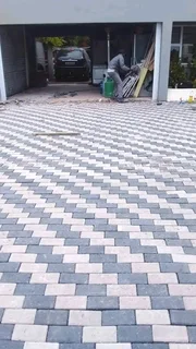 We do tar driveway resurfacing concrete paving building roofing plaster