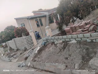 We do retaining walls tar driveway resurfacing concrete paving building roofing plaster