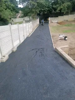 We do retaining walls tar driveway resurfacing concrete paving building roofing plaster