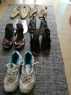 Six pairs of ladies Sandles and one pair of sneakers