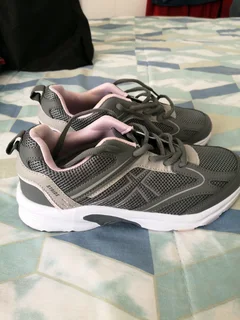 one pair of ladies sneakers size five