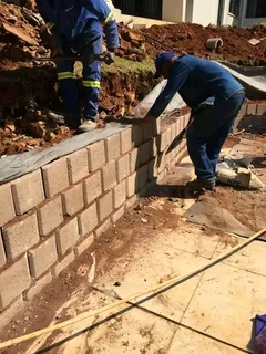 Retainer wall blocks installation