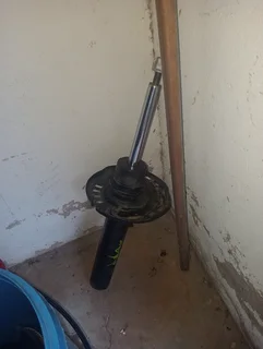 Mazda front shock for sale good condition like new sell or swop for good condition compressor.