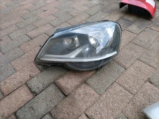 POLO vivo/polo bujwa headlight left