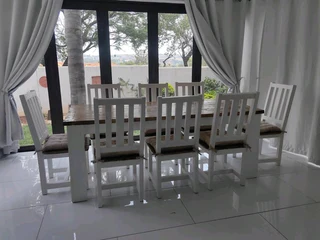 8 seater dinning table with chairs available