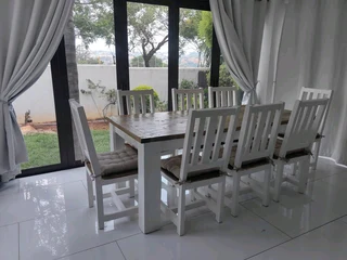 8 seater dinning table with chairs available