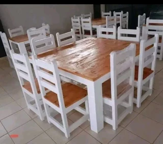 8 seater dinning table with 8 chairs available