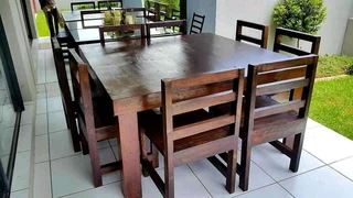 8 seater dinning table with 8 chairs available