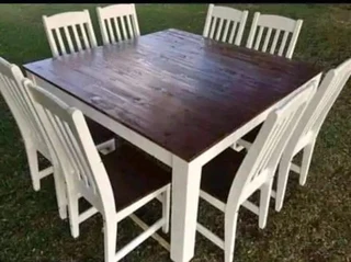 8 seater dinning table with 8 chairs available