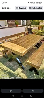 10 seater dinning table and chairs available