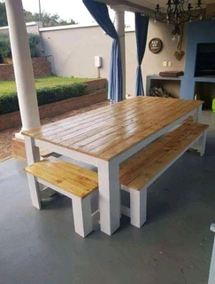 10 seater dinning table and chairs available