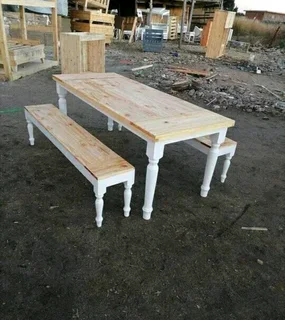8 seater dinning table with 2 benches available