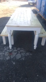 12 seater dinning table with 2 benches available