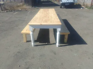 12 seater dinning table with 2 benches available