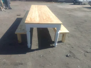 12 seater dinning table with 2 benches available